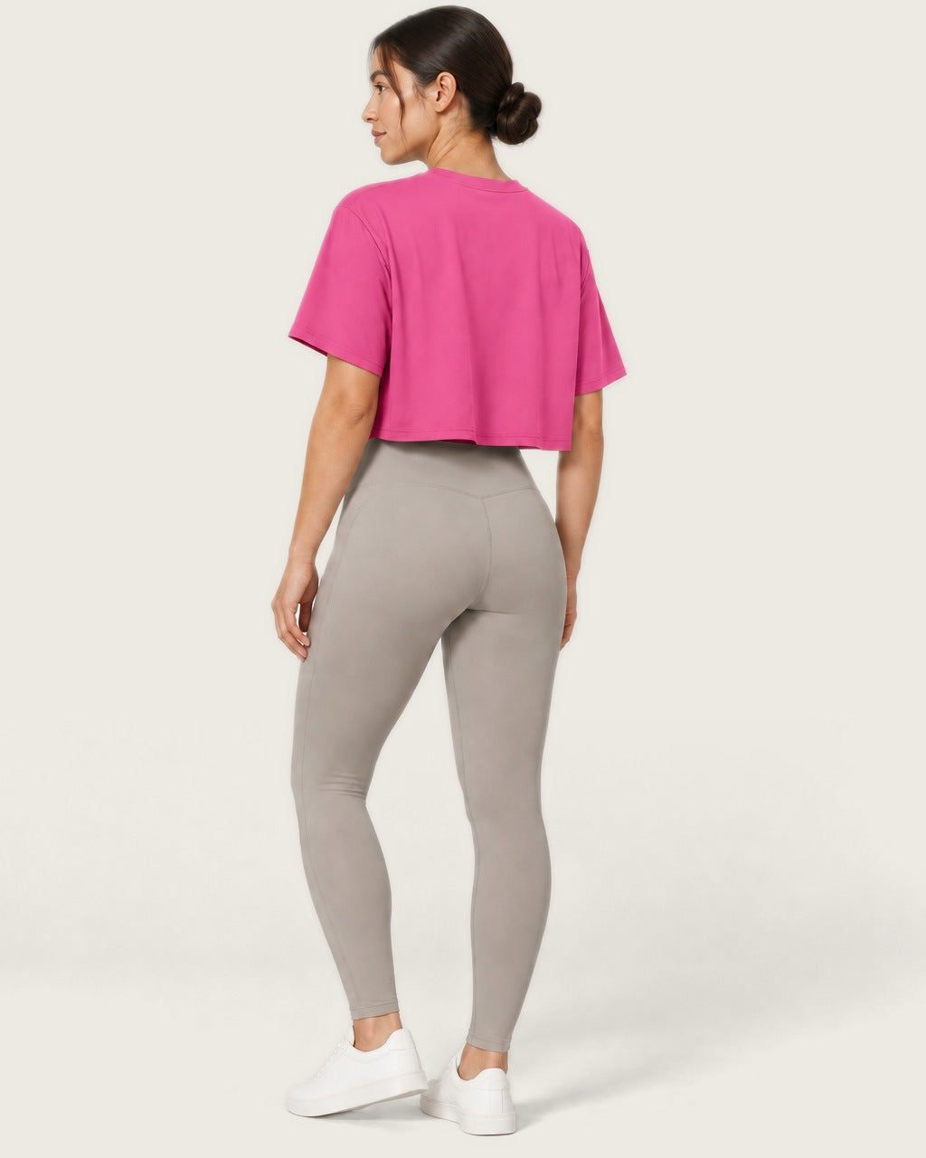 ROMY Ease Cropped Tee in Fuchsia — three-quarter back view
