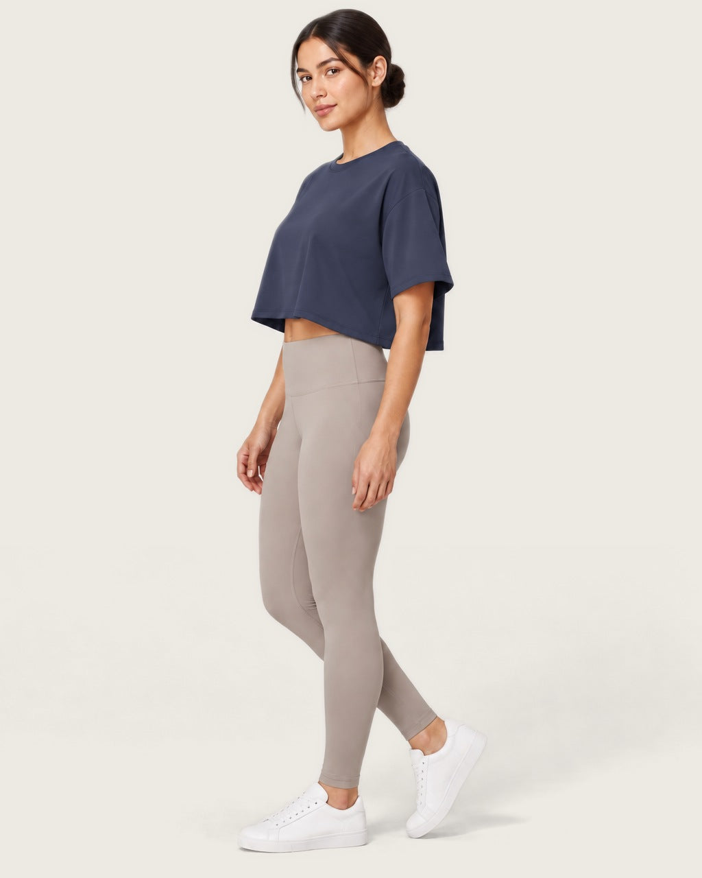 ROMY Ease Cropped Tee in Navy — side profile