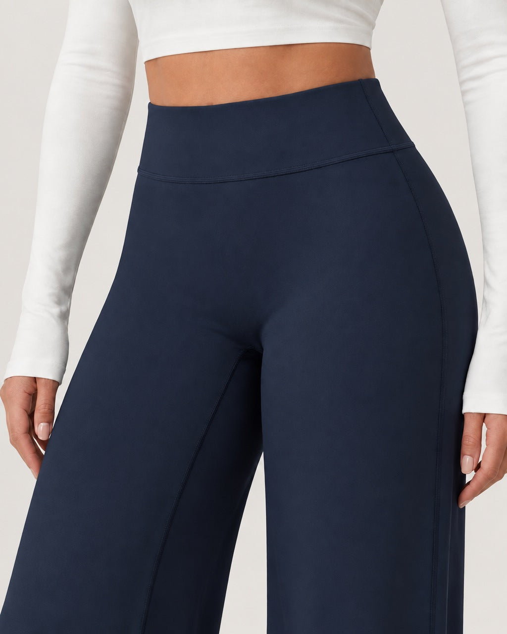 ROMY Ease Wide Leg Pant in Navy — close-up of waistband and fabric