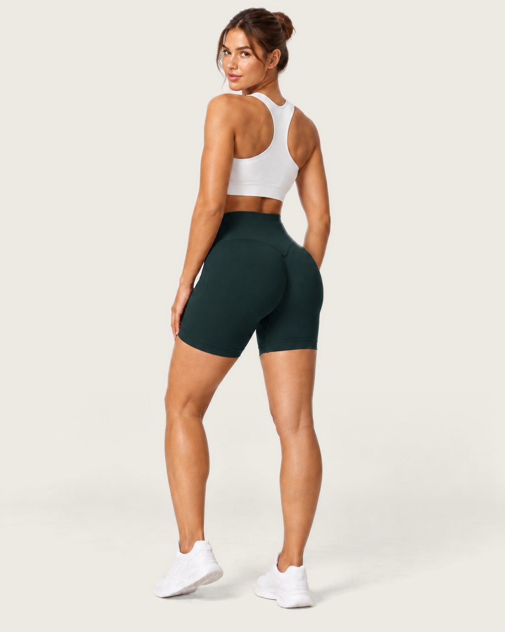 ROMY Form Seamless Shorts in Forest — three-quarter back view