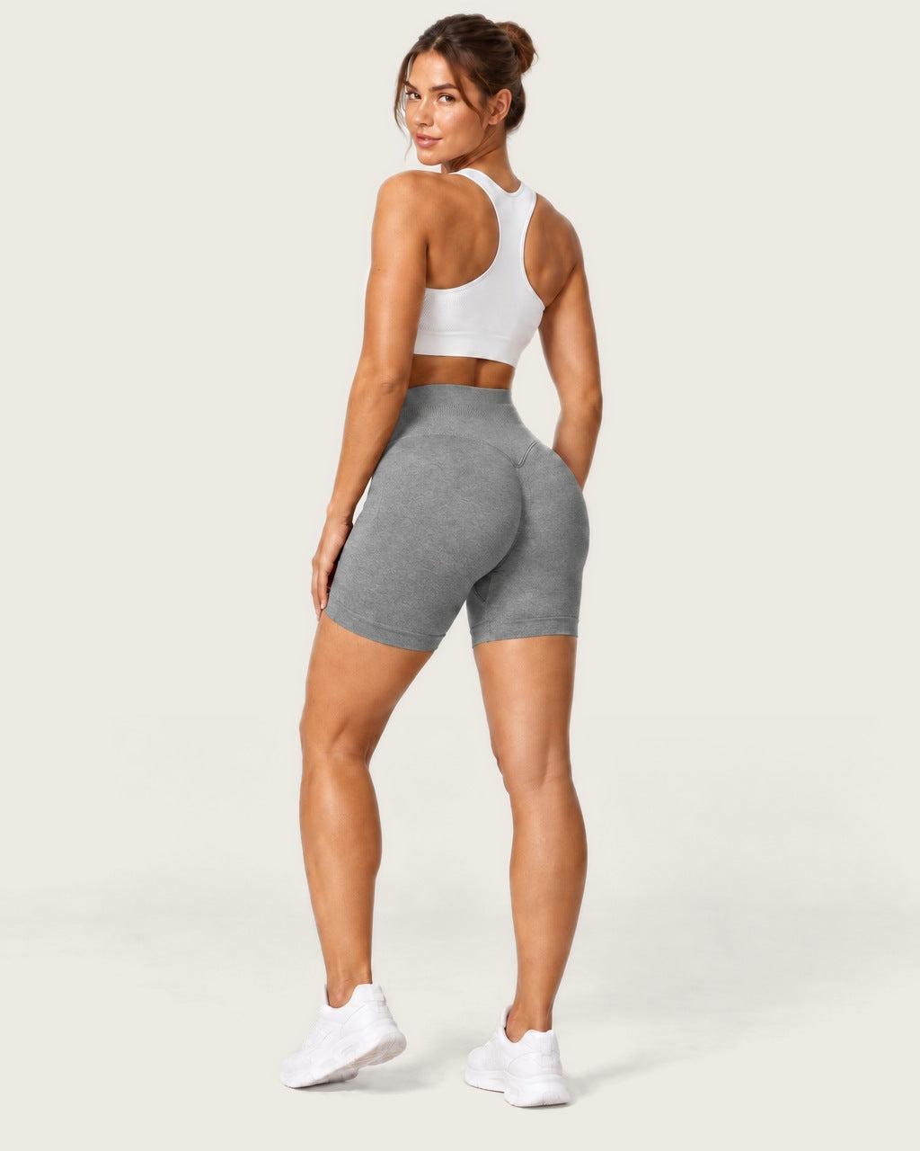 ROMY Form Seamless Shorts in Heather Grey — three-quarter back view