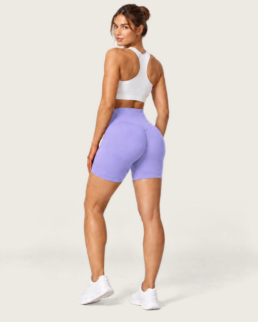 ROMY Form Seamless Shorts in Lavender — three-quarter back view