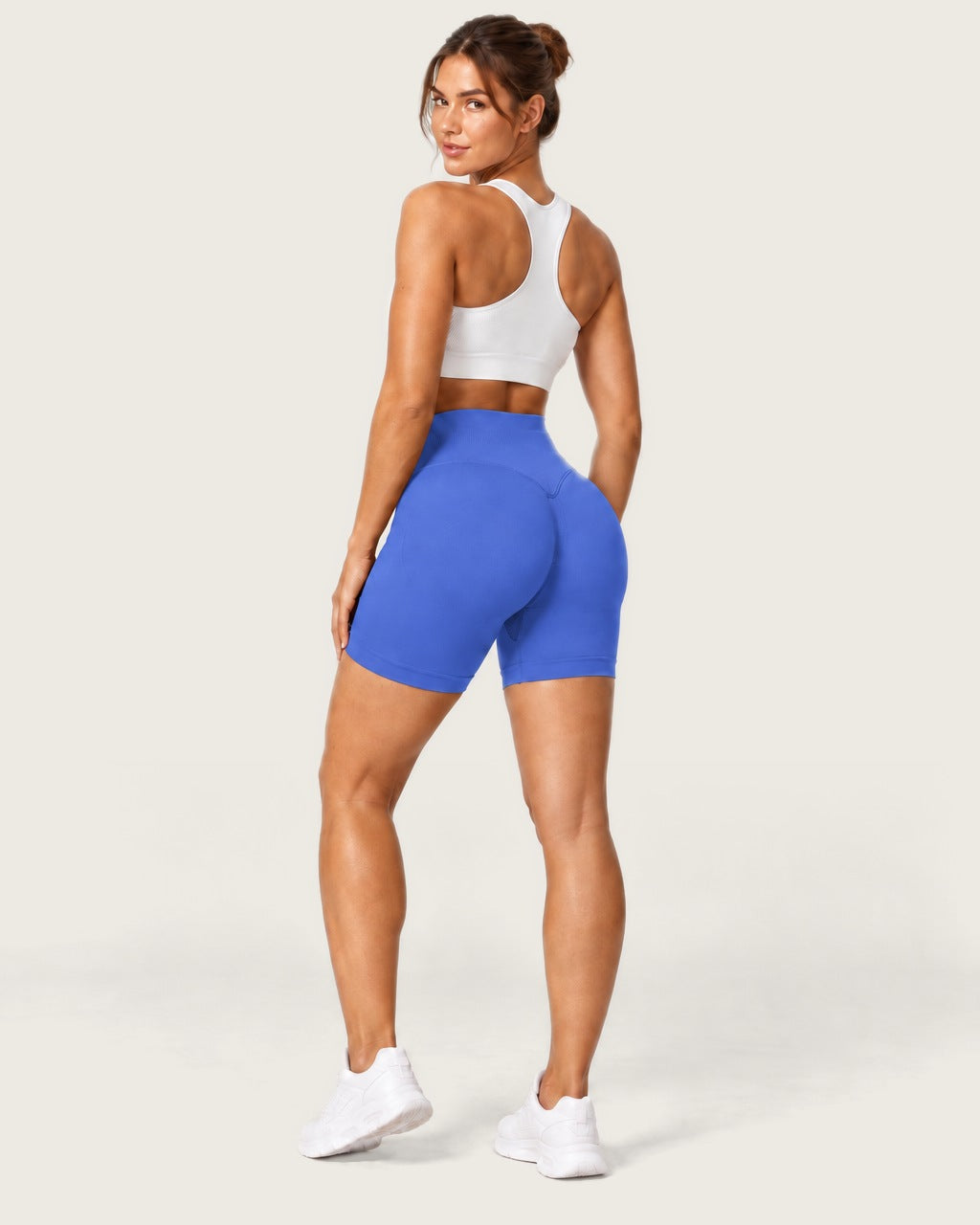 ROMY Form Seamless Shorts in Royal — three-quarter back view