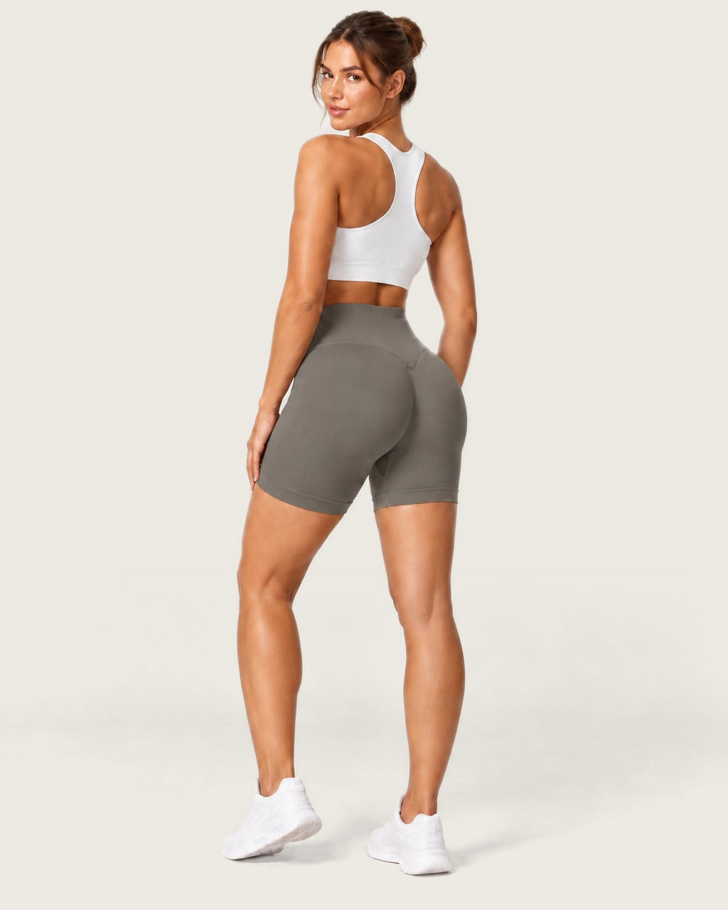 ROMY Form Seamless Shorts in Taupe — three-quarter back view