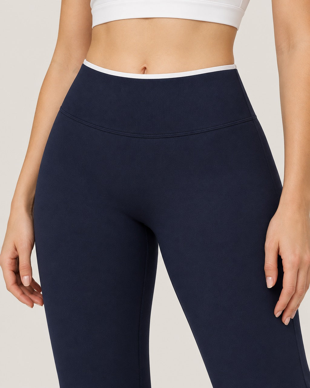 ROMY Sculpt Contrast Waist Flare Pant in Navy — close-up of waistband and fabric