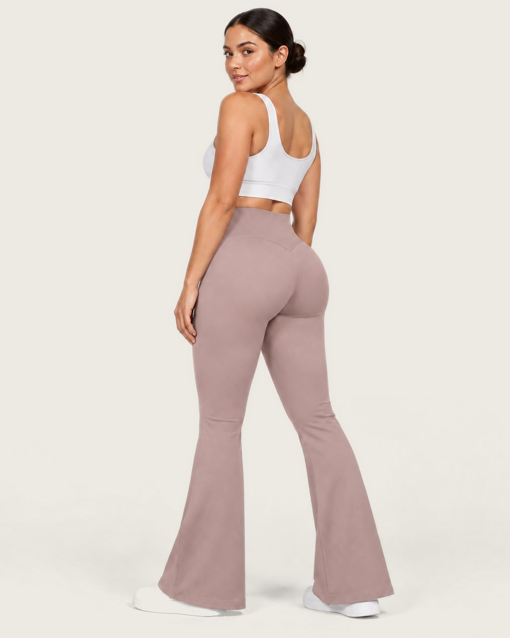 ROMY Sculpt Flare Pant in Dusty Rose — three-quarter back view