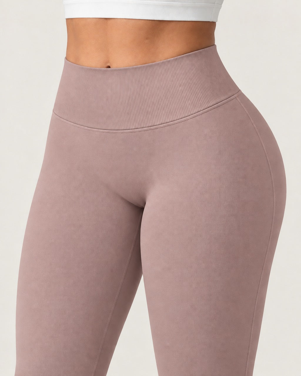ROMY Sculpt Flare Pant in Dusty Rose — close-up of waistband and fabric