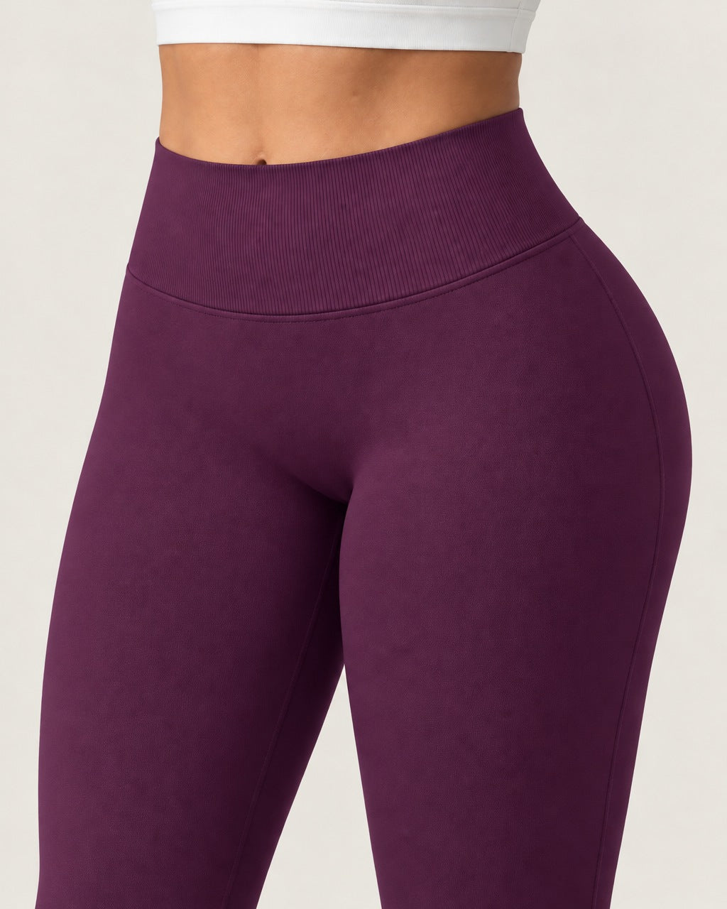 ROMY Sculpt Flare Pant in Plum — close-up of waistband and fabric