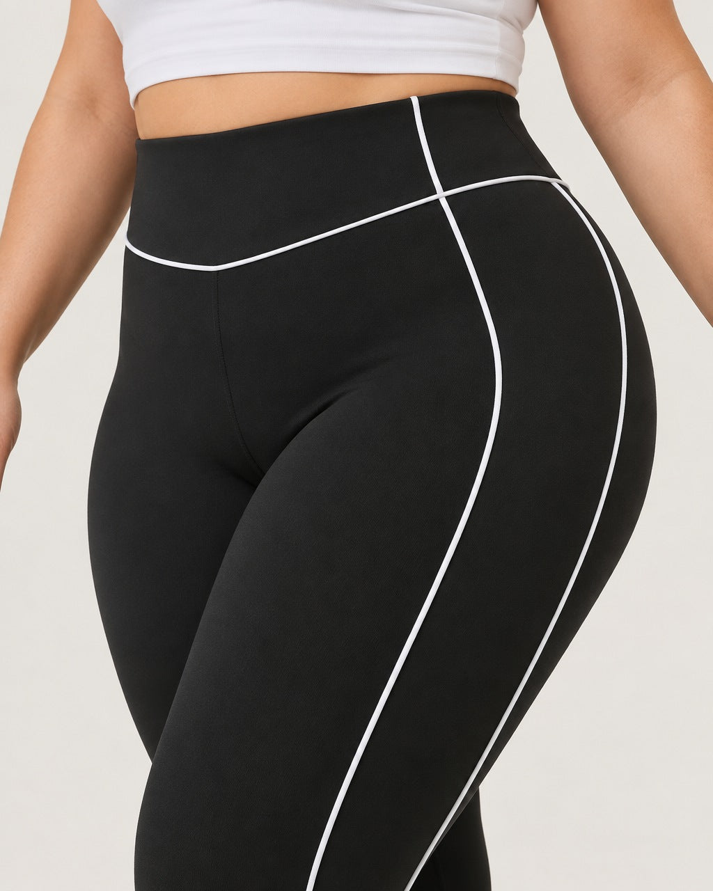 ROMY Sculpt Plus Contrast Piping Legging in Black — close-up of waistband and fabric