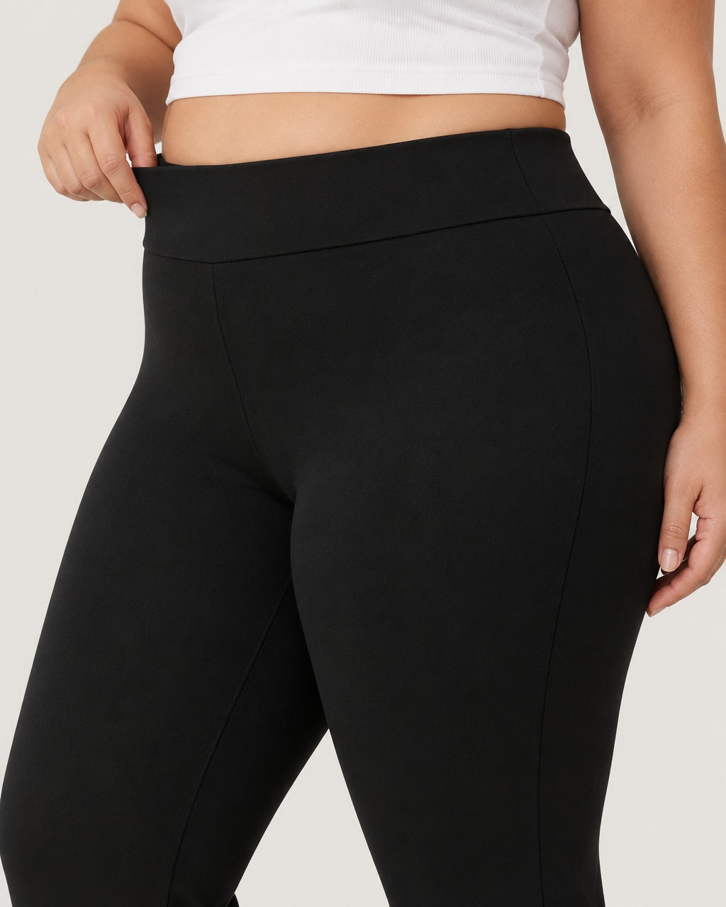 ROMY Sculpt Plus Flare Pant in Black — close-up of waistband and fabric
