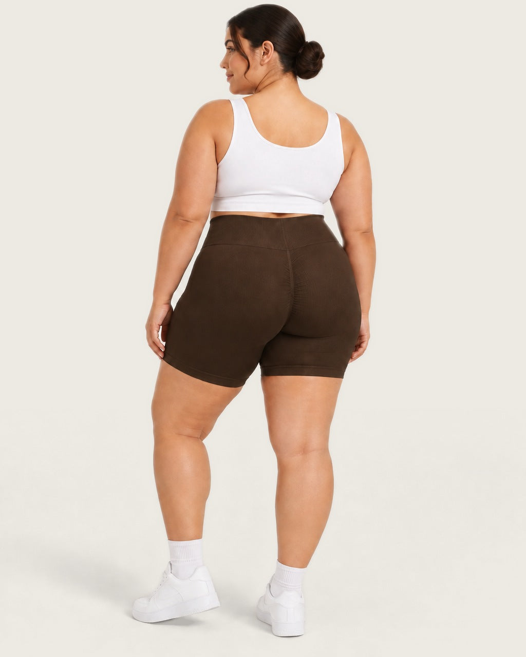 ROMY Sculpt Plus Ruched Shorts in Espresso — three-quarter back view