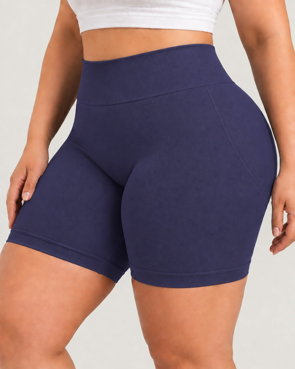 ROMY Sculpt Plus Ruched Shorts in Navy — close-up of waistband and fabric