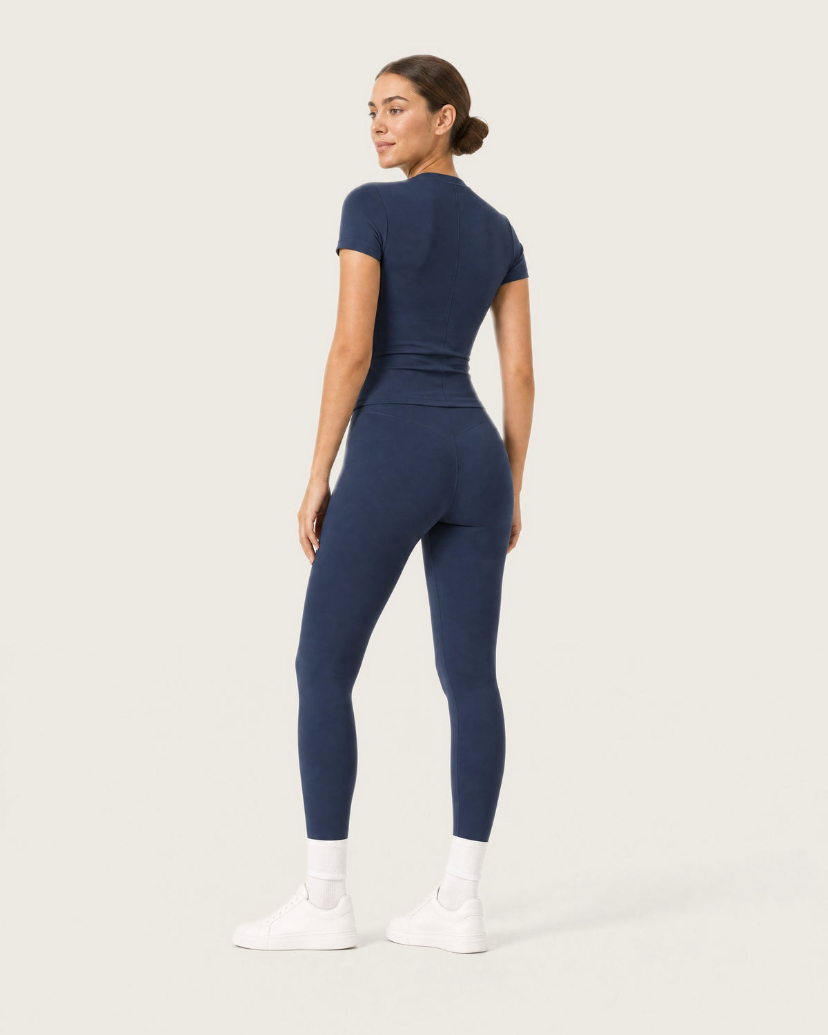 ROMY Studio Legging Set in Navy — three-quarter back view