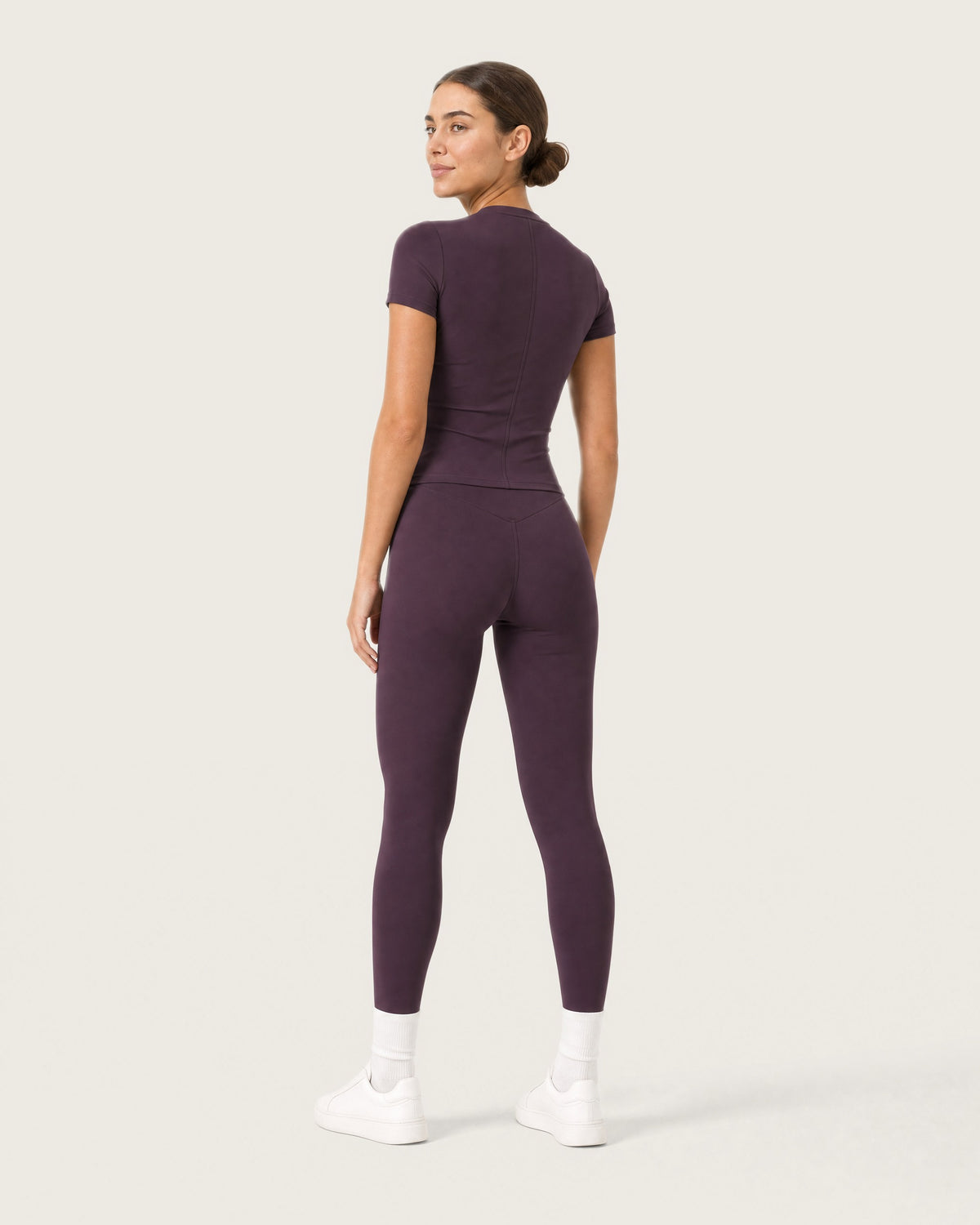 ROMY Studio Legging Set in Plum — three-quarter back view