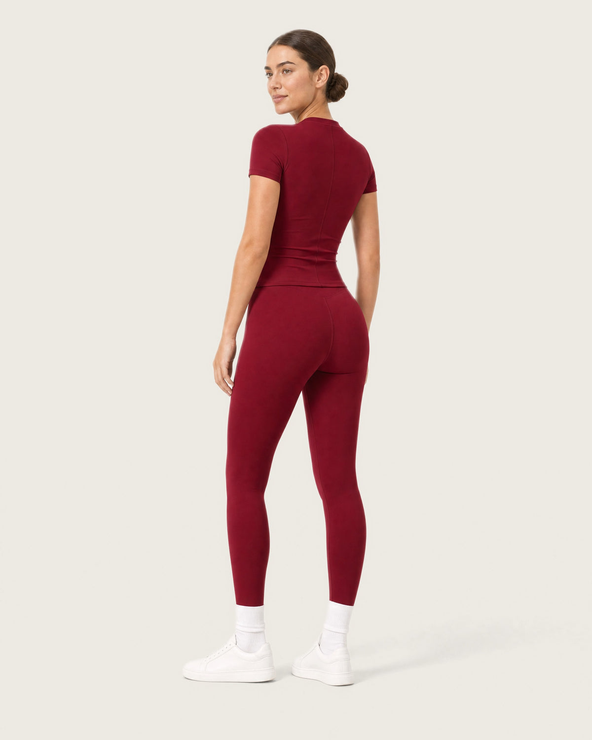 ROMY Studio Legging Set in Wine — three-quarter back view