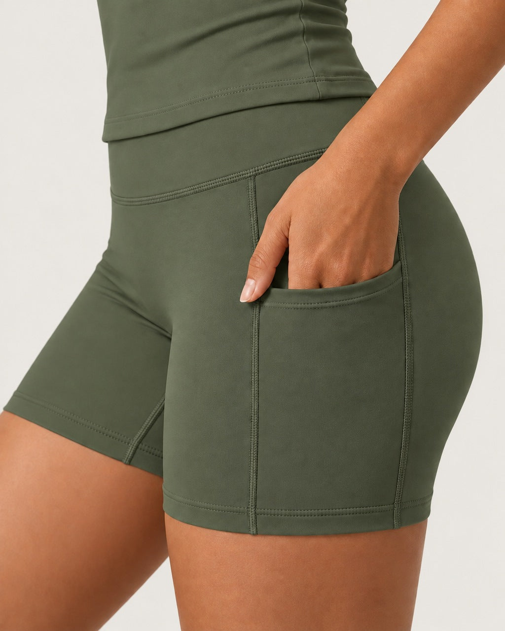 ROMY Studio Pocket Short Set in Olive — close-up of waistband and fabric