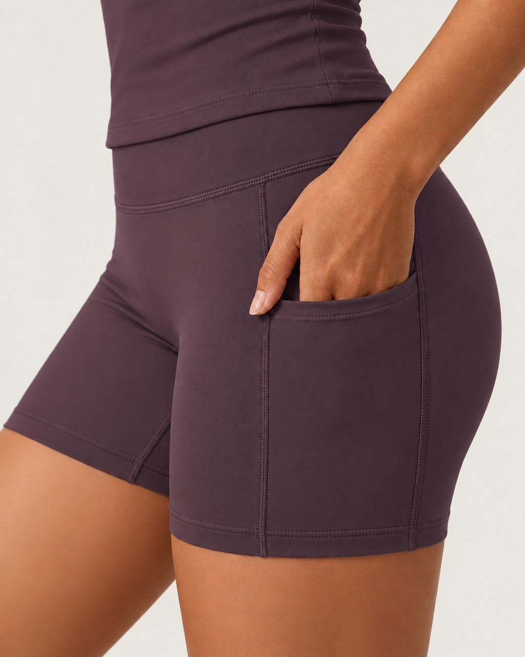 ROMY Studio Pocket Short Set in Plum — close-up of waistband and fabric