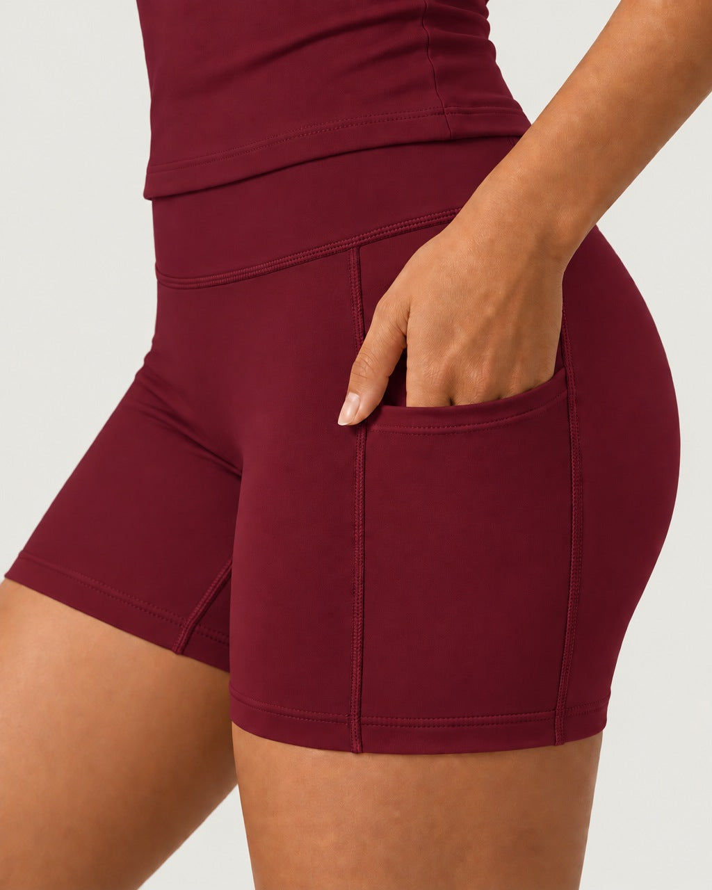 ROMY Studio Pocket Short Set in Wine — close-up of waistband and fabric
