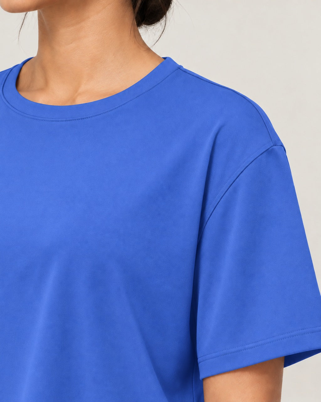 ROMY Ease Cropped Tee in Royal — close-up detail