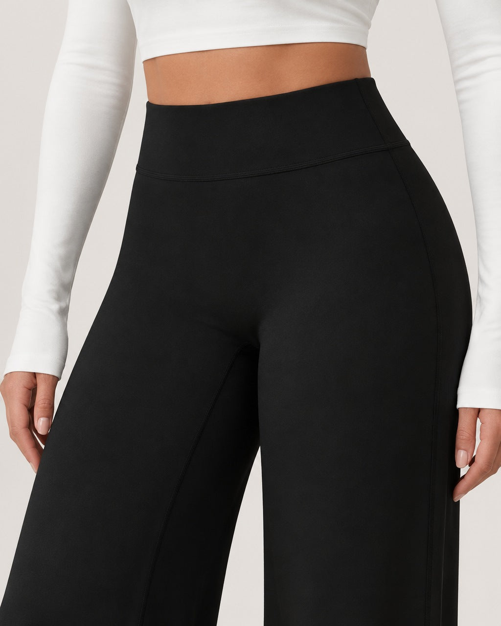 ROMY Ease Wide Leg Pant in Black — close-up of waistband and fabric