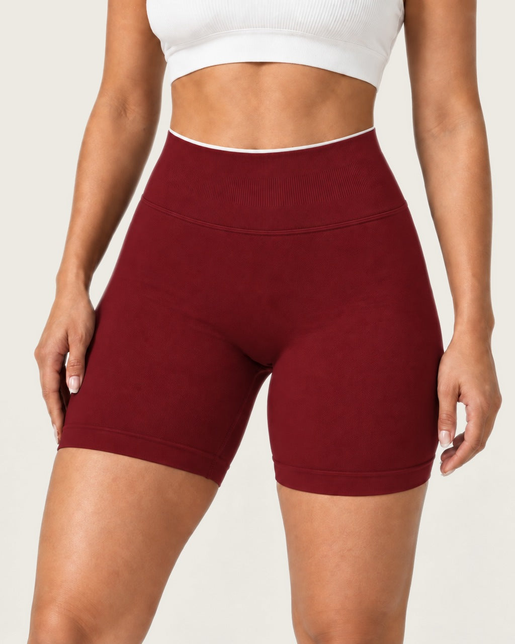 ROMY Form Contrast Waist Shorts in Wine — product view