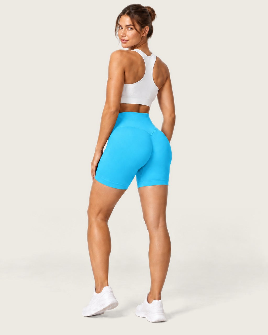 ROMY Form Seamless Shorts in Aqua — three-quarter back view