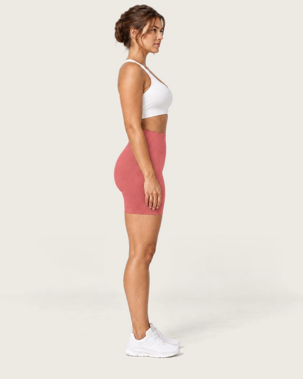 ROMY Form Seamless Shorts in Coral — side profile