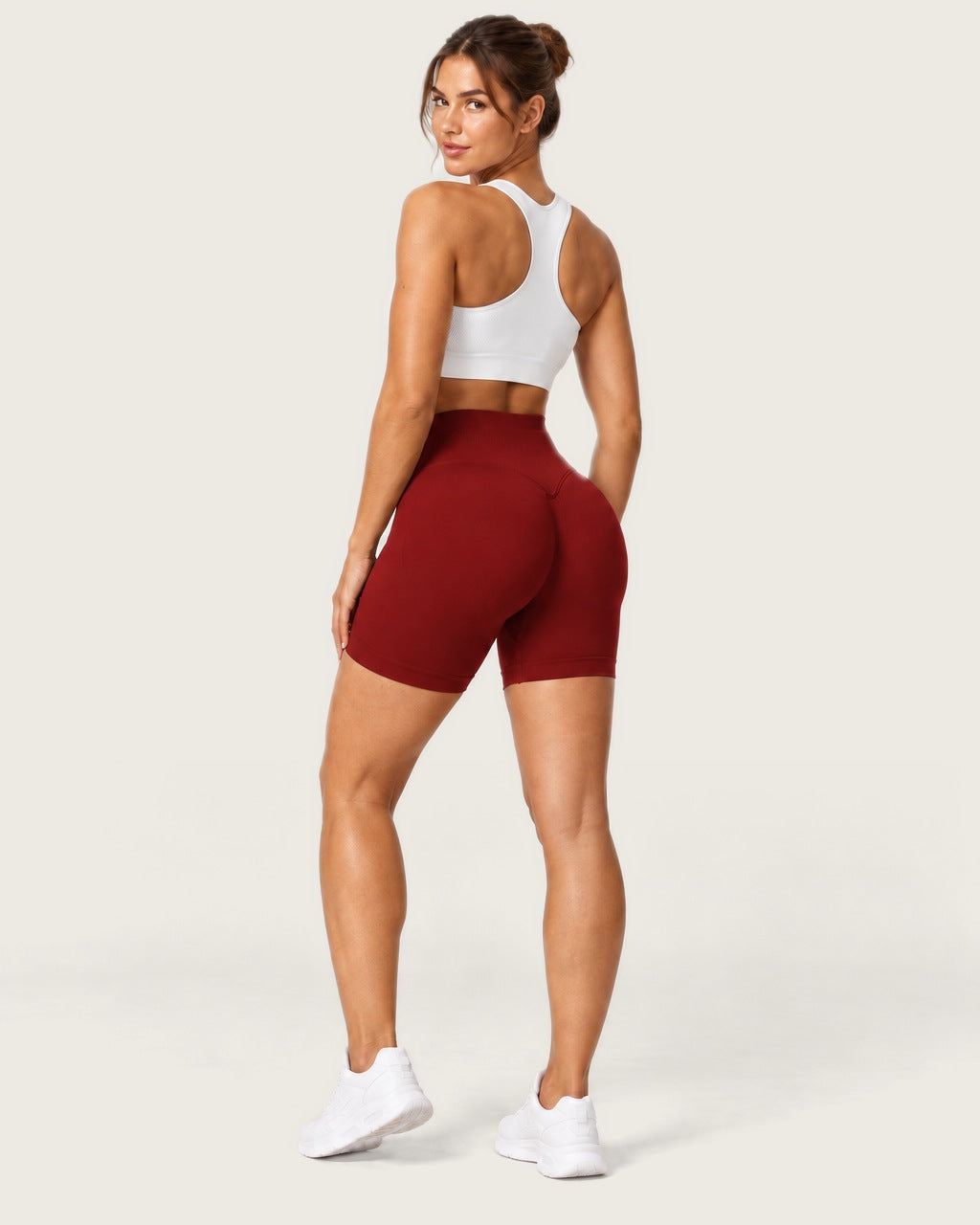 ROMY Form Seamless Shorts in Crimson — three-quarter back view