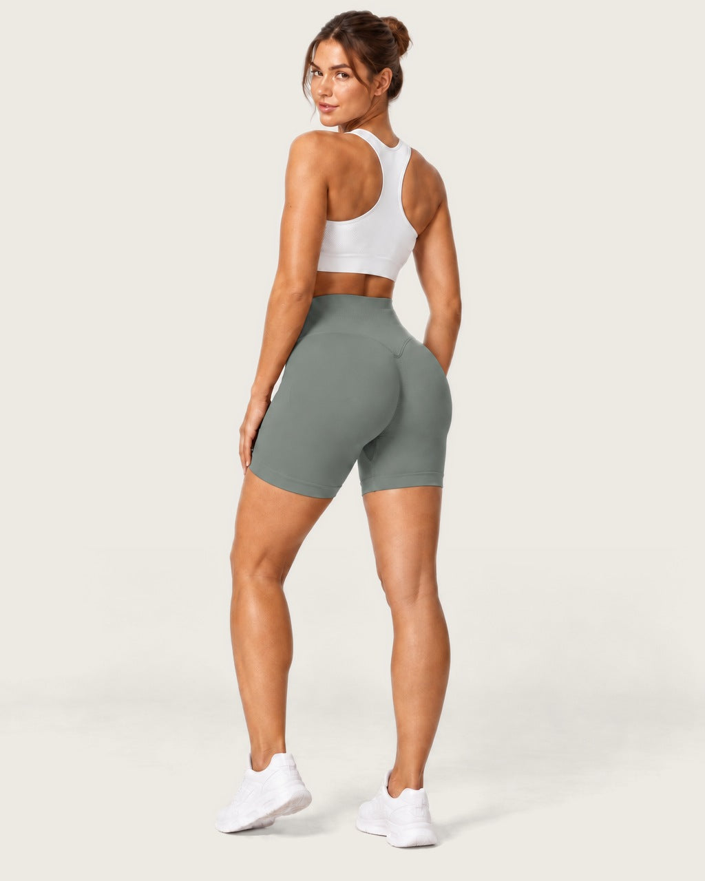 ROMY Form Seamless Shorts in Eucalyptus — three-quarter back view