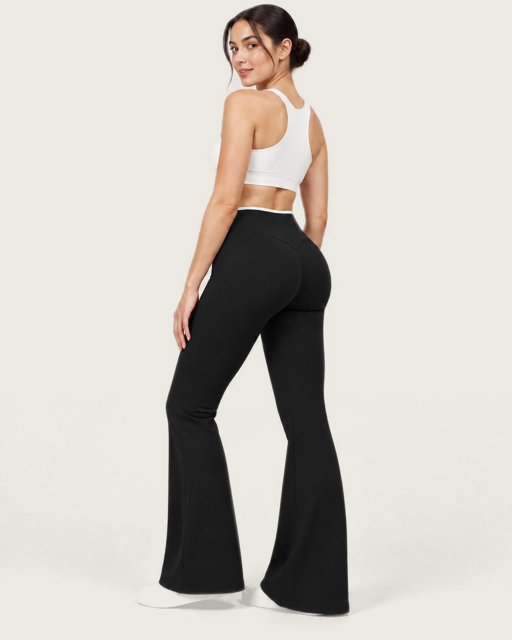ROMY Sculpt Contrast Waist Flare Pant in Black — three-quarter back view