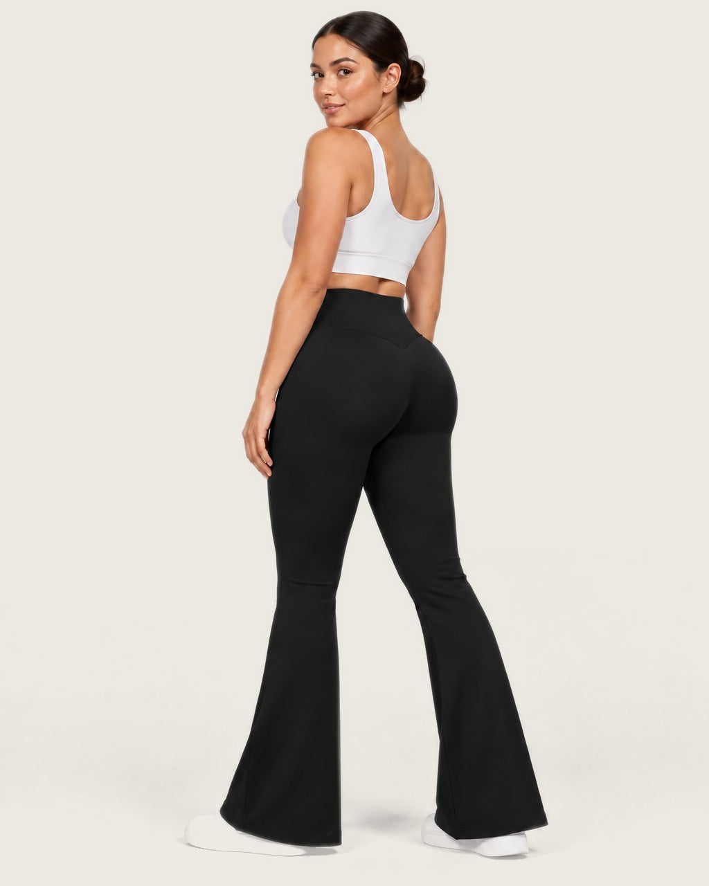 ROMY Sculpt Flare Pant in Black — three-quarter back view