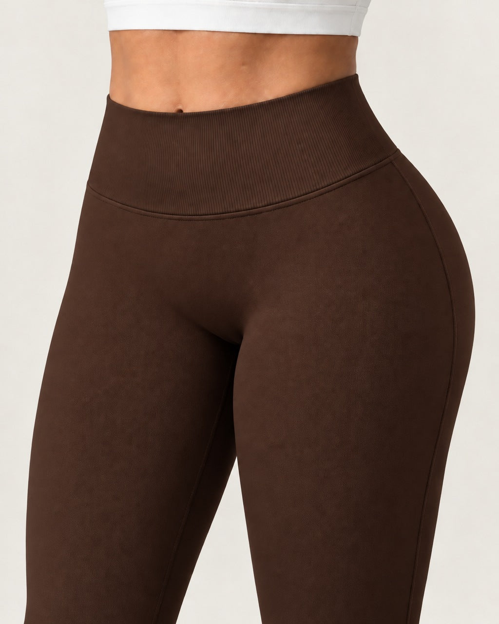 ROMY Sculpt Flare Pant in Espresso — close-up of waistband and fabric