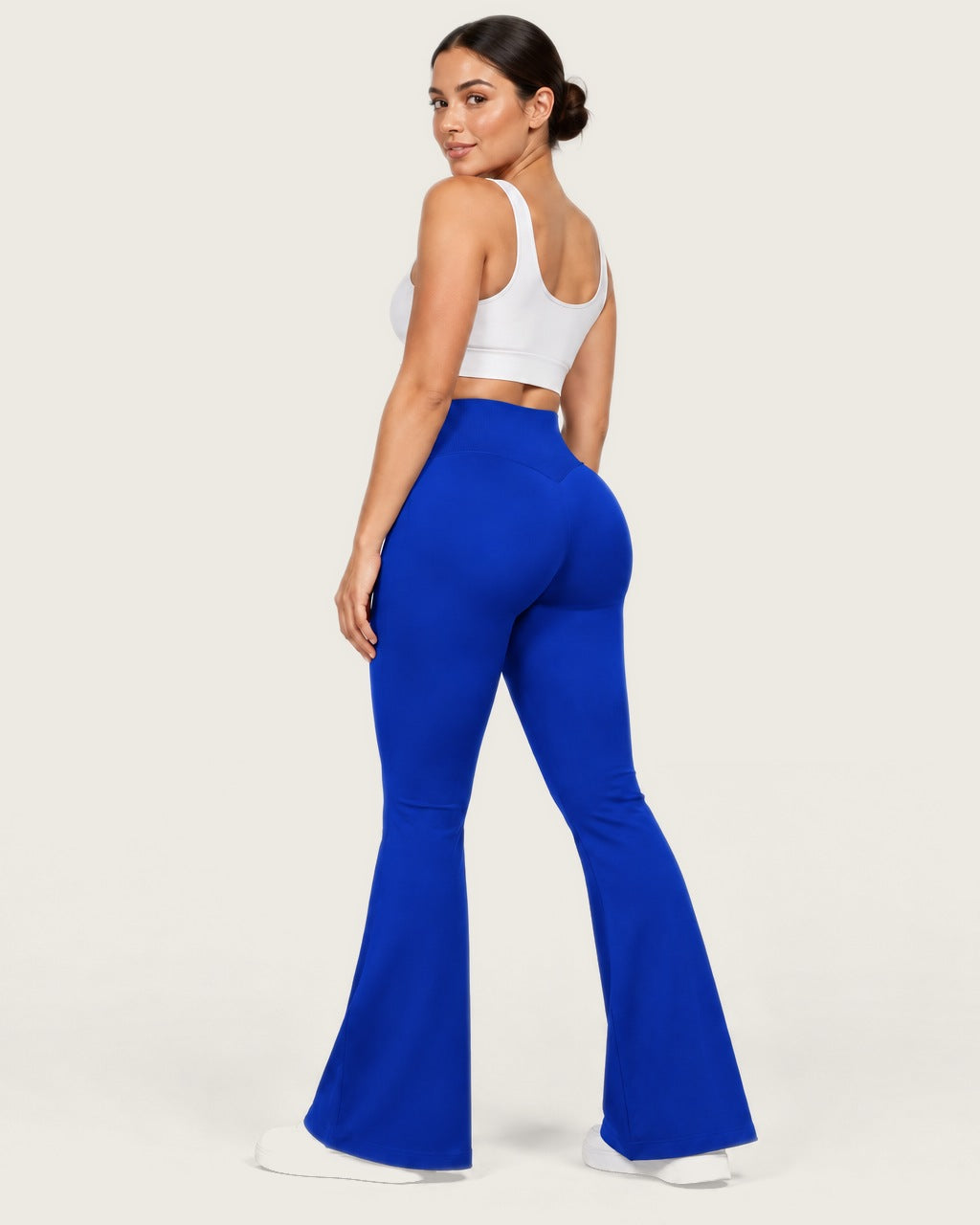 ROMY Sculpt Flare Pant in Royal — three-quarter back view