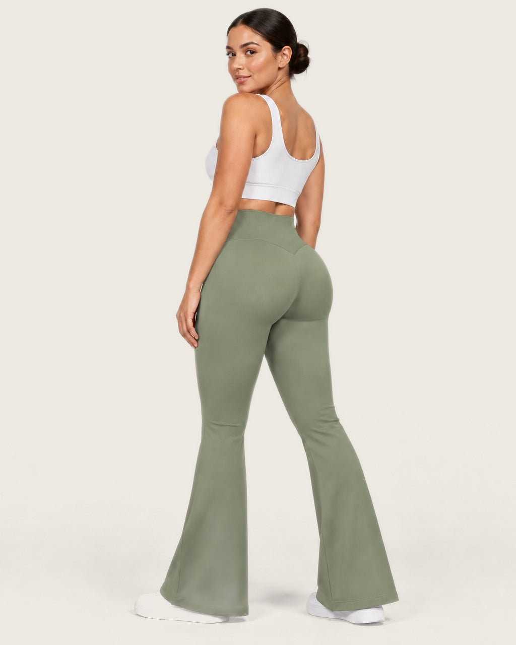 ROMY Sculpt Flare Pant in Sage — three-quarter back view