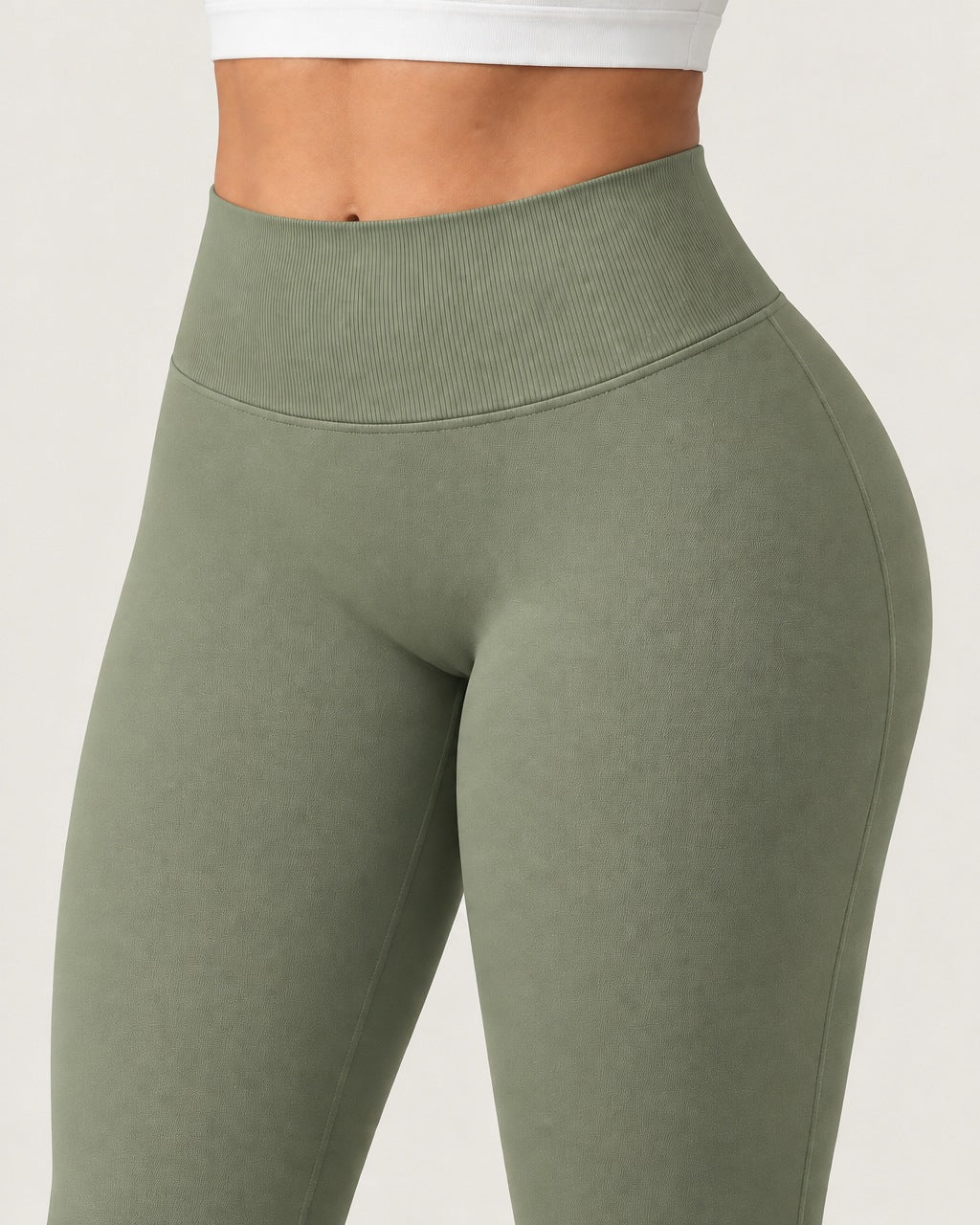 ROMY Sculpt Flare Pant in Sage — close-up of waistband and fabric