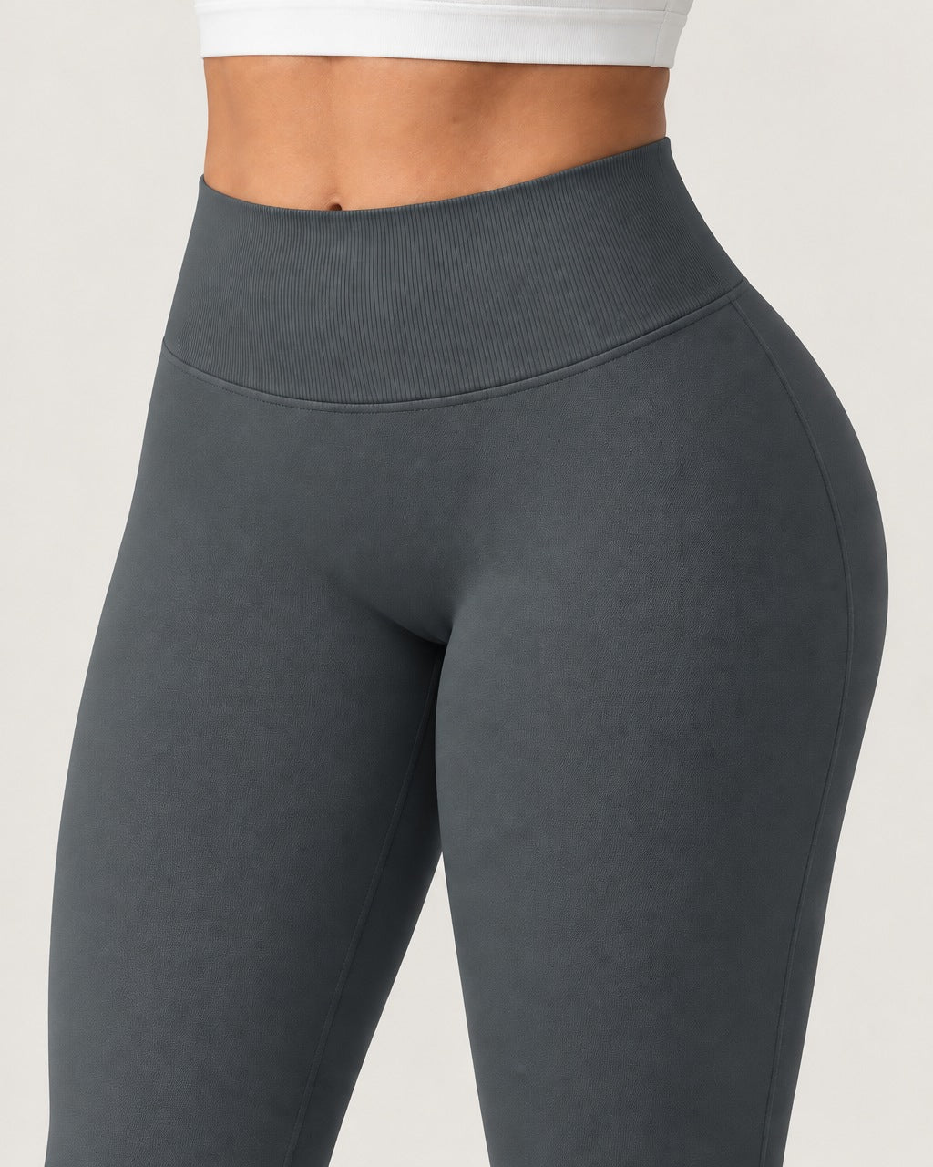 ROMY Sculpt Flare Pant in Slate — close-up of waistband and fabric