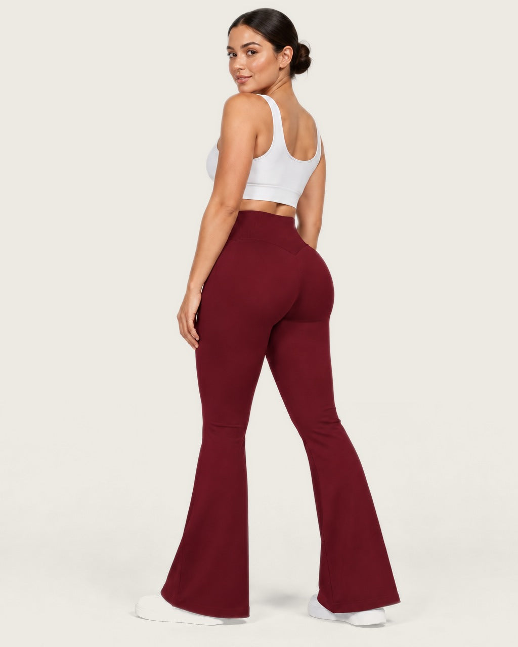ROMY Sculpt Flare Pant in Wine — three-quarter back view