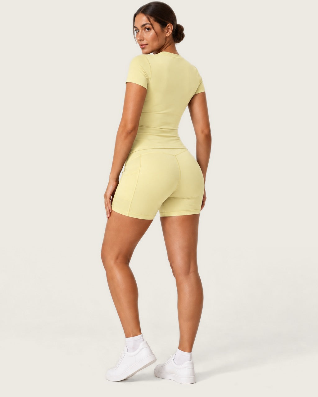 ROMY Studio Pocket Short Set in Butter — three-quarter back view
