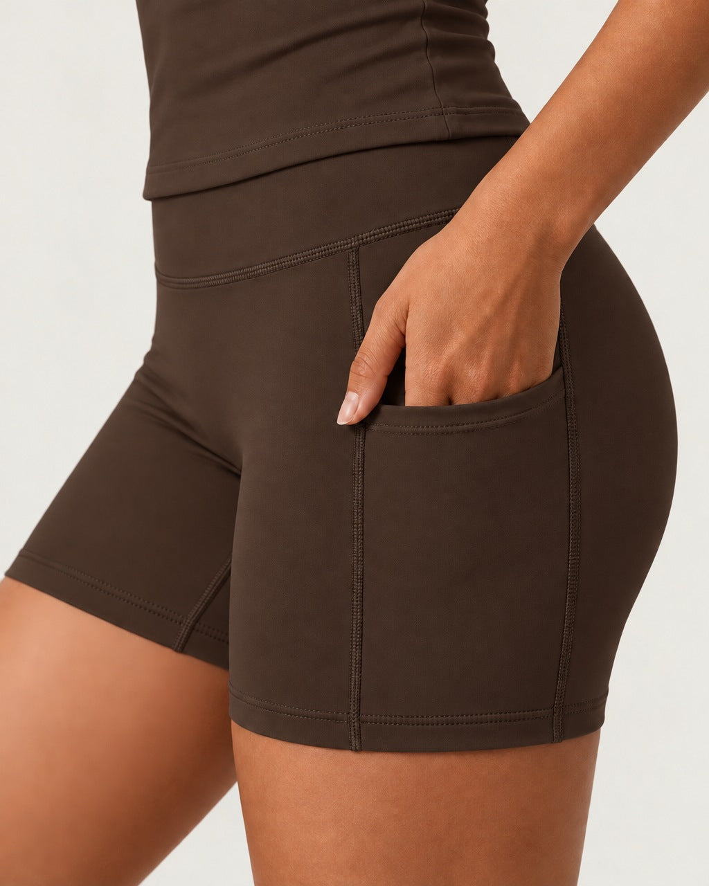 ROMY Studio Pocket Short Set in Espresso — close-up of waistband and fabric