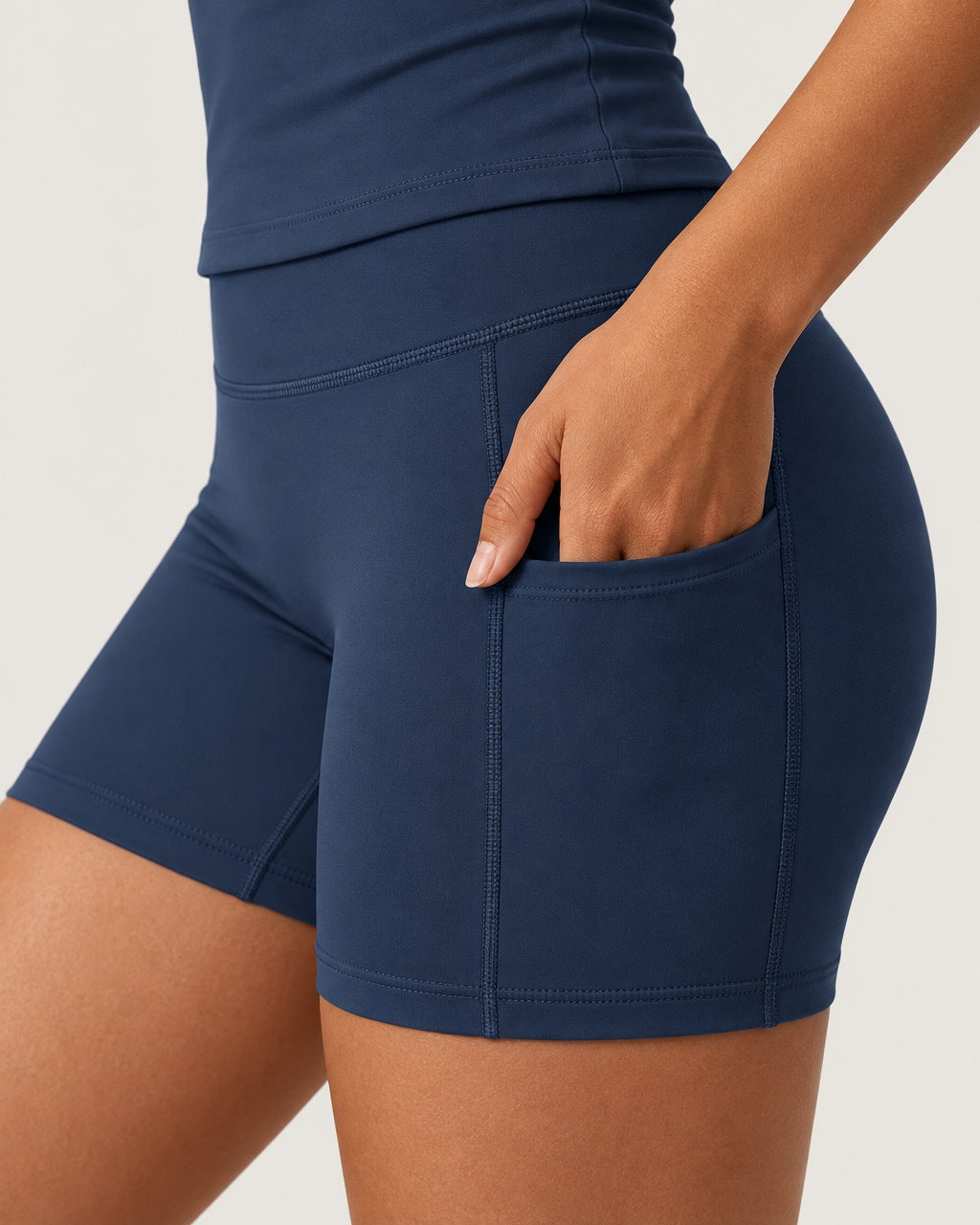 ROMY Studio Pocket Short Set in Navy — close-up of waistband and fabric