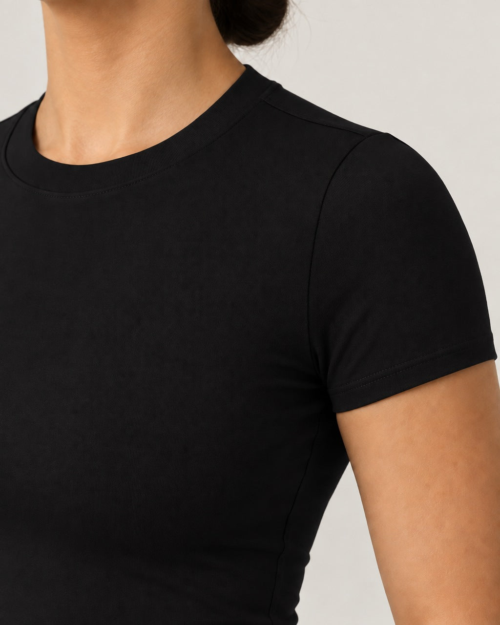 ROMY The Anchor Top in Black — close-up of waistband and fabric